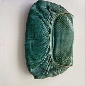 Botega Veneta snake skin clutch